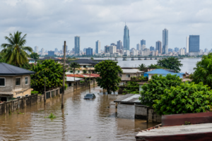 Flooded residential street in Lagos showing flood risk for property and real estate