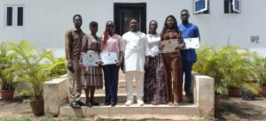 Graduates of the Green Realty Africa Internship Programme (GRAIP) holding their certificates